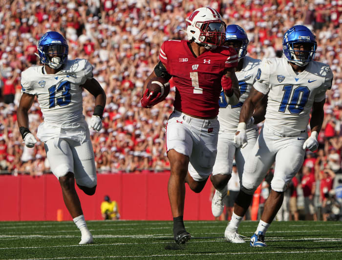 Sep 2, 2023; Madison, WI, USA; Wisconsin Badgers running back Chez Mellusi (1) runs 89 yards for a touchdown against the Buffalo Bulls during the the third quarter at Camp Randall Stadium. Mandatory Credit: Mark Hoffman-USA TODAY Sports